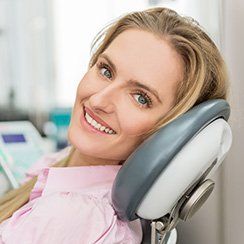 Smiling woman in dental chair