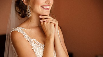 Bride smiling in her wedding dress