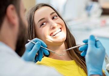 Patient smiling at cosmetic dentist in Melbourne