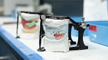 Dentures being crafted in a lab