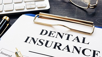Dental insurance paperwork for the cost of dental implants in Melbourne