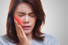 woman with mouth pain