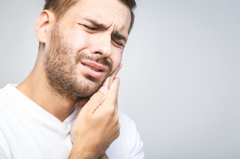 Man has oral pain