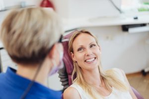 A patient smiling at her dentist in Melbourne.