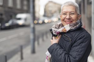 Woman smiling with dental implants in Melbourne